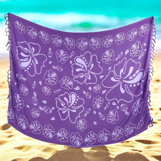 Lila sarong med hibiskusmönster‑tryck