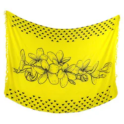 Gult strandtyg med svarta hibiskusblommor